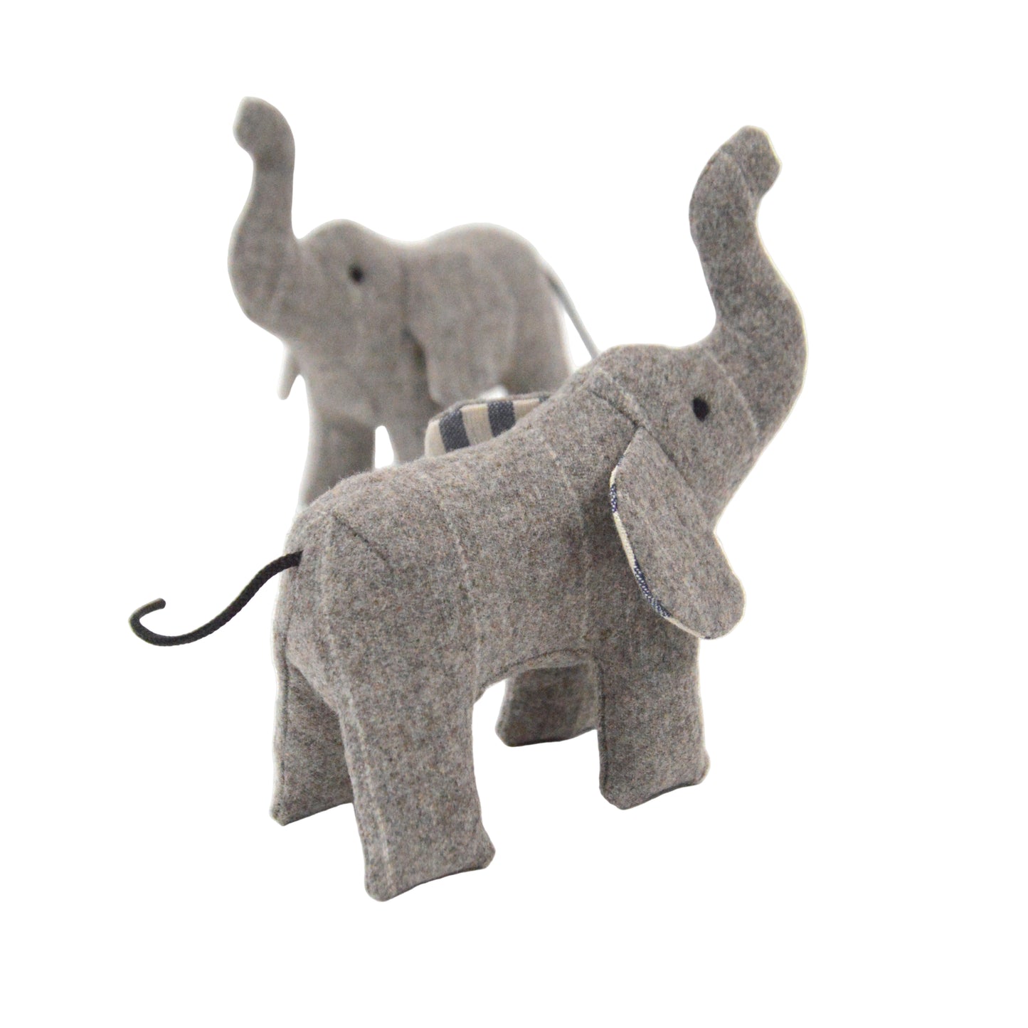 Two gray elephant toys on a white background